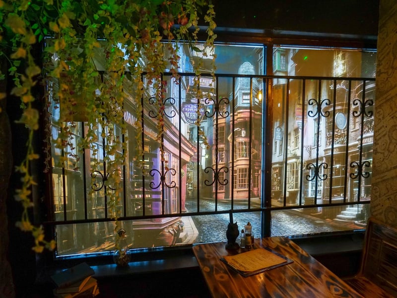 Tables are spacious and inviting, as wall art provides the perfect scenic view from your seat.