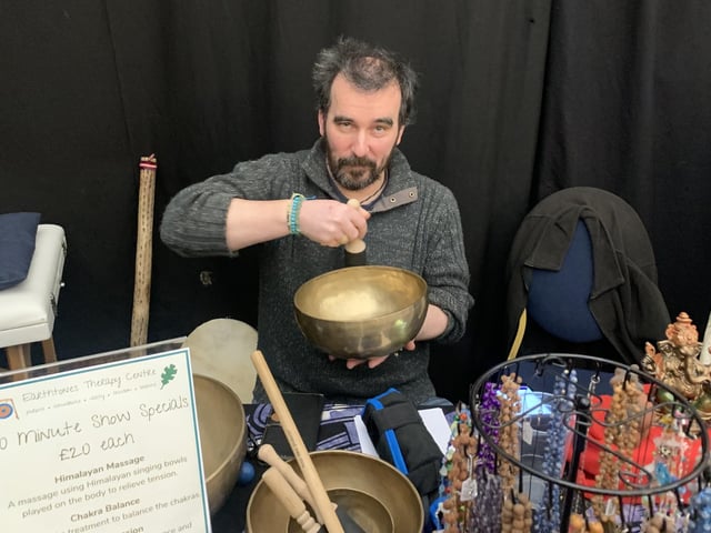 Alex Nivlet, of the Earthtones Therapy Centre in Mansfield, playing the singing bowl.