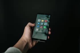 iPhone with social media apps showing