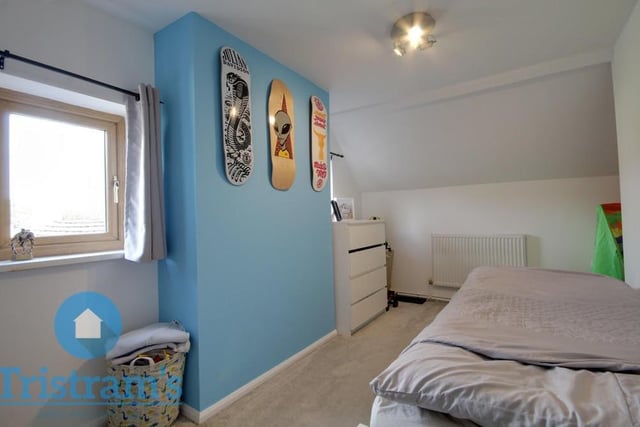 This is bedroom number two at the £295,000 cottage. Again, the floor is carpeted, while two uPVC windows to the side let in a good amount of light .