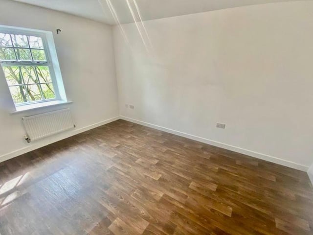 The apartment has been well maintained throughout, with this polished bedroom providing a perfect example. Room for a double bed and more.