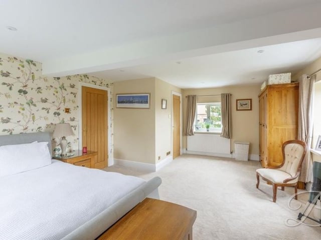 The master bedroom has plenty of space for wardrobes, storage and furniture. It has the added luxury of a dressing room and also its own shower room.