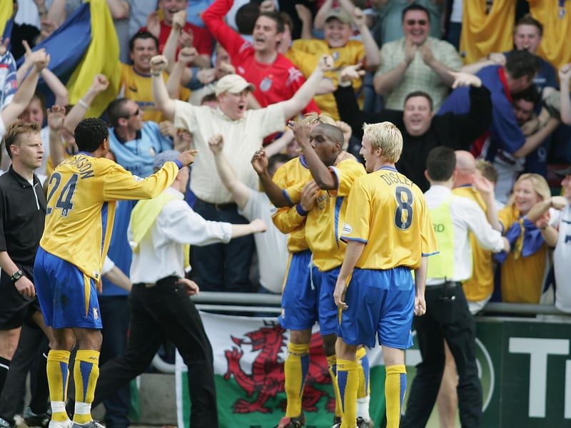 Mansfield town's fans and players celebrate a goal by Junior Mendes as Stags beat Northampton 2-0 in the Division Three first leg play-off on May 16, 2004.