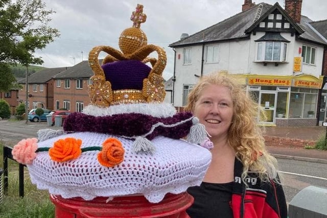 Becky Power with a crown topper she has made for a postbox at the junction of Mansfield Road and Vicars Court in Clipstone.