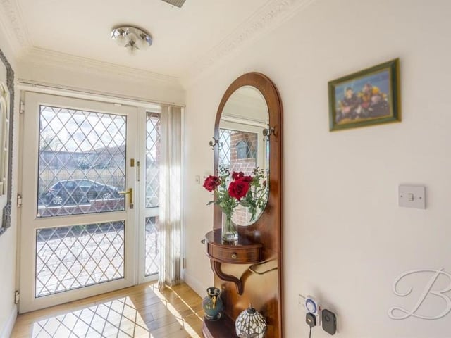 Before we head outside, let's take a look at the entrance hallway. First impressions can only be positive when you step through this front door.
