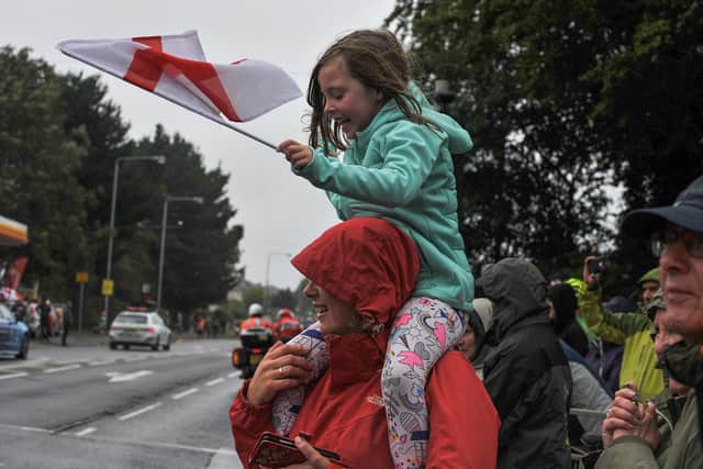 Spectators, young and old, line the streets as the Tour Of Britain passes through the Chad district four years ago.