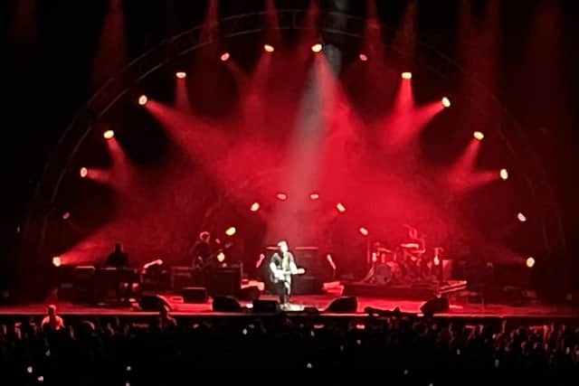 Jake Bugg on stage at Nottingham's Motorpoint Arena.