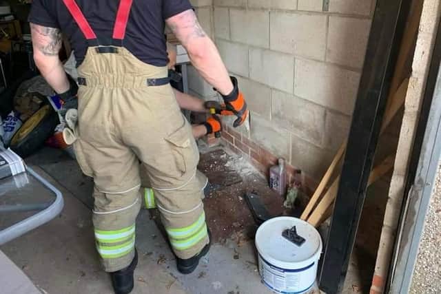 Firefighters had to chip through concrete