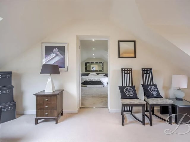 This versatile bedroom could also work as a living area.