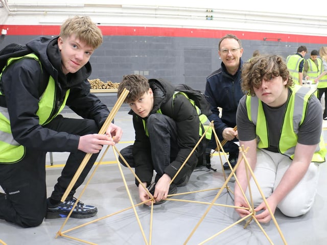 Alpha Construction's operations manager Robin Denton showed groups the art of tetrahedron building