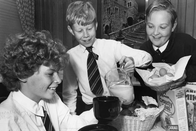 Cafe au lait for Nicola Christie as she enjoys a continental breakfast in the Mortimer Comprehensive School restaurant, with Graham Hall and Ian Maskell.