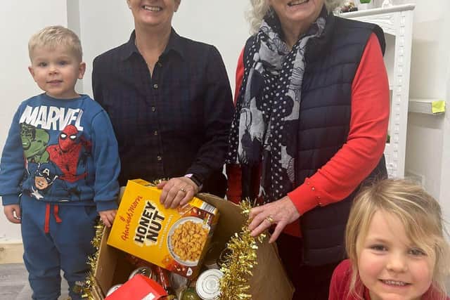 Volunteers from Edwinstowe Food Hub collecting the donations from Pre-School.