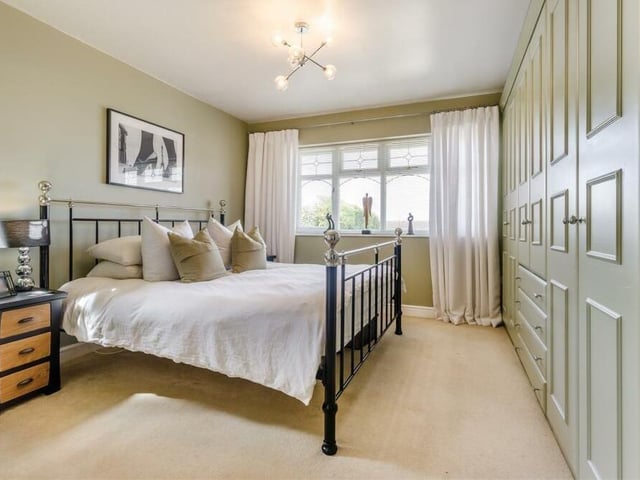 Time now to check out the four bedrooms, beginning with this marvellous master. A spacious, dual-aspect suite, it includes extensive fitted wardrobes with double hanging rails, shelves and four drawers.