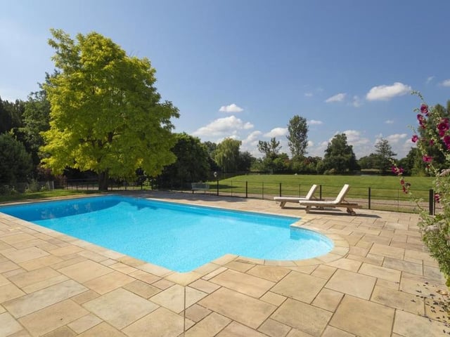 At a mansion costing £10 million, an outdoor swimming pool is obligatory - and here it is, set among the parkland. Just one part of a magical setting that creates a unique house at Hunton Hall.