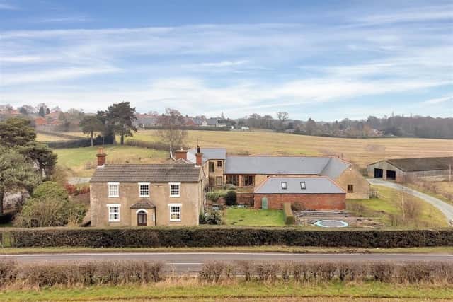 The new homes are being built on agricultural land to the north, south and east of The Old Farmhouse property