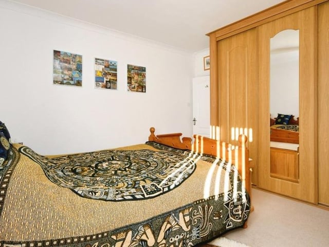 Storage space abounds in the second double bedroom, thanks to these wonderful wardrobes.