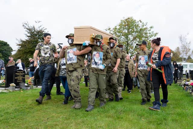 Declan's funeral was attended by many of his friends and family, wearing matching t-shirts and masks.