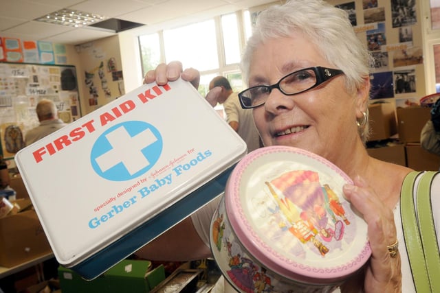 At Mansfield Museum Metal Box Memory Day in 2010. Anne Adams who worked at Metal Box between 1973 and 1999 pictured with some of the tins she remembers.