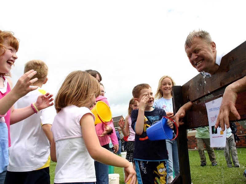 Headteacher Rob Cook got soaked in the stocks at the summer fair held at Orchards Primary School in Kirkby. This was the school's first summer fair, and the funds raised will be used to purchase adventure play equipment for the students. 2007.