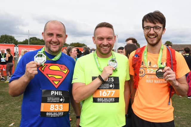 Phil Rippon, Chris Cupit and Tom Hayes with their medals