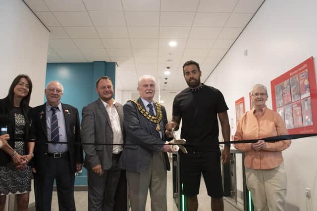 Former England footballer Tom Huddlestone cuts the opening ribbon to officially open the new centre. (Photo by: Ashfield Council)