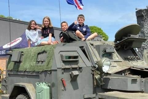 Children were able to ride on a jeep.