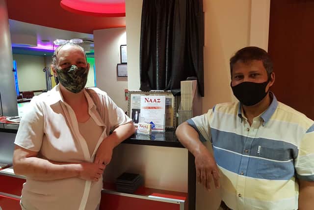 Cheryl Martins, who runs the centre, is pictured with Kasa Miah, of the Naaz restaurant at Mansfield Woodhouse.