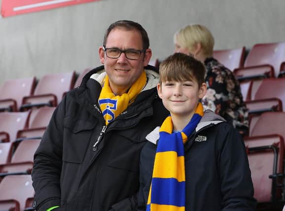Some of the Mansfield fans who travelled to see their side draw 1-1 at Northampton on 13th April 2019.