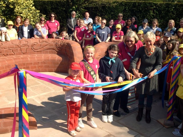 In 2010 Nottinghamshire Girl Guiding Association unveiled a seat designed by Welsh based sculpture Gwen Heeney at Rufford Country Park as part of the Association's Centenary celebrations. County Commissioner Dee Miles and sculpture Gwen Heeney cut the ribbon assisted by a Rainbow, Brownie and Guide.