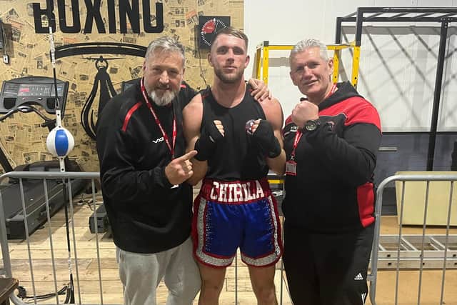 Alex celebrating victory with Ashfield Spartans Coaches.