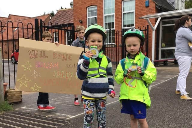 Close friends William Burton (left) and AJ Coleman (right) decided to raise money for their school during lockdown.