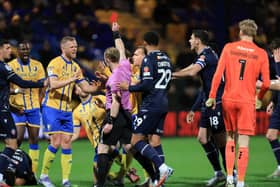 Mansfield Town forward Rhys Oates (18) receives a red card during the Sky Bet League One match against Bolton Wanderers FC at the One Call Stadium, 09 Dec 2025, Photo credit Chris & Jeanette Holloway / The Bigger Picture.media