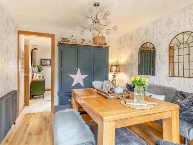 The delightful dining room has a lot of character to it. The space boasts an oak floor, coving to the ceiling and a cast-iron anthracite radiator. It leads directly into the open-plan kitchen/diner and living space extension.