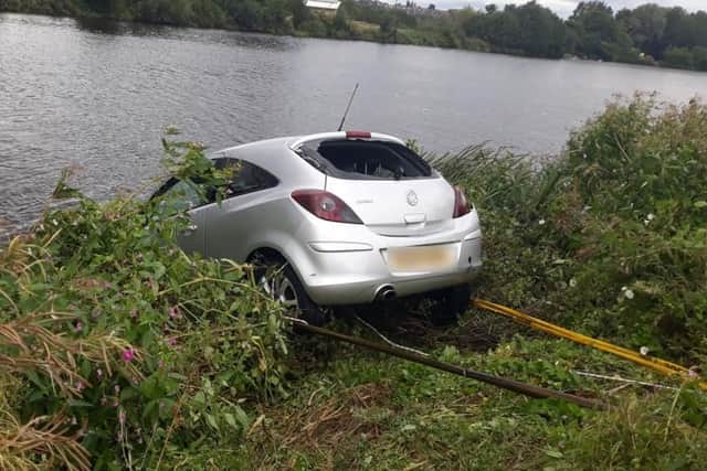 A car had to be pulled out of the River Trent this afternoon after two suspects tried to evade police.