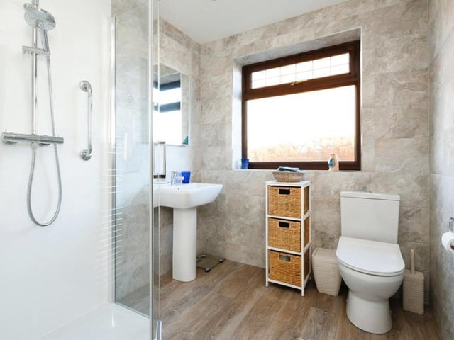 Next to the main bedroom is this guest shower room, which effectively acts as an en suite. If you think it's looking good, it's because it has been recently refitted.