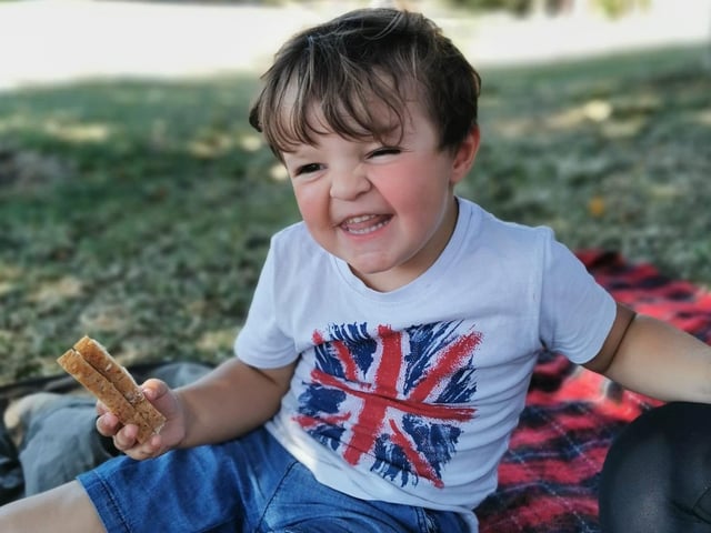 Hot weather 8: Little Charlie Wiliams is all smiles as he enjoys a picnic in Bidbury Park, Bedhampton. Picture: Donna-Marie Williams