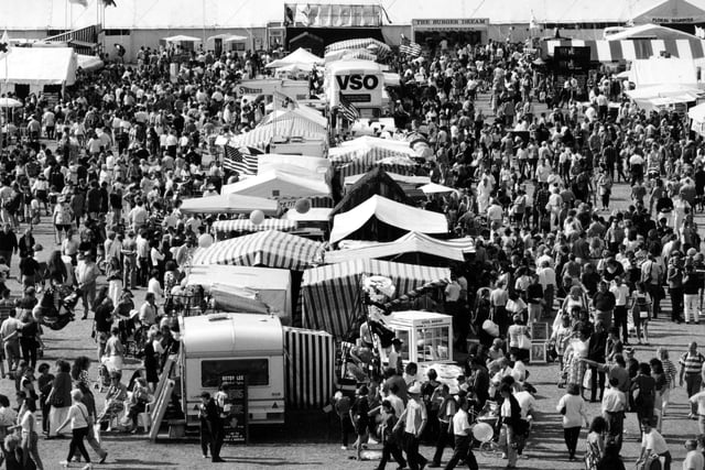 Thousands of Southsea Show visitors making their way around the busy showground in the Sunday afternoon sunshine in August 1995. The News PP4100