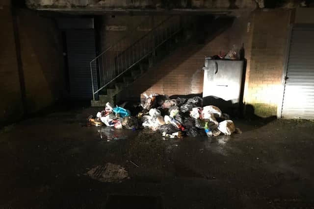 The pile of rubbish left by fly-tippers