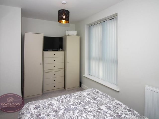 This bedroom at the Brewhouse Mews house also has plenty of storage space.