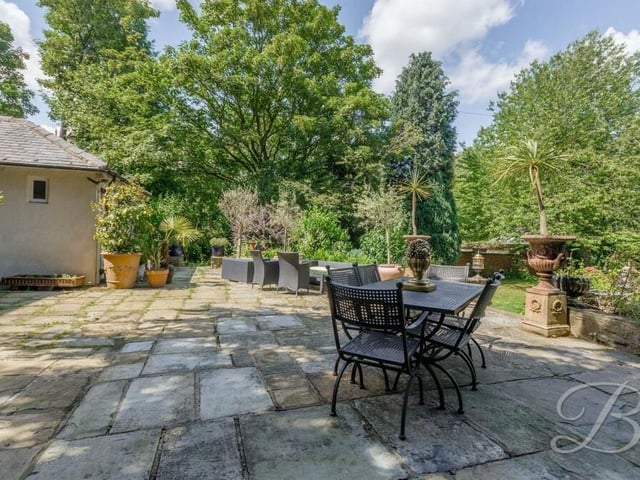One of the main features of the back garden is this charming patio seating area.