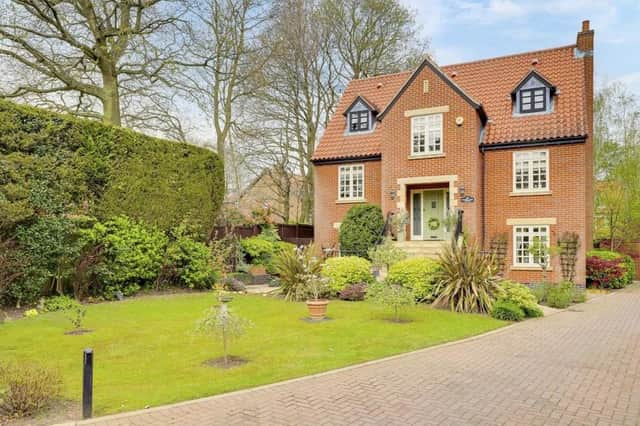 This desirable, four-bedroom, three-storey house on Longdale Lane in Ravenshead is on the market with estate agents Holden Copley for £950,000.