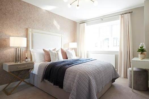 The guest bedroom is a versatile space, with blues and dark brass tones applying finishing touches. As Jayne Swift, of Jones Homes, says: "A guest bedroom should appeal to many because no two guests are the same."