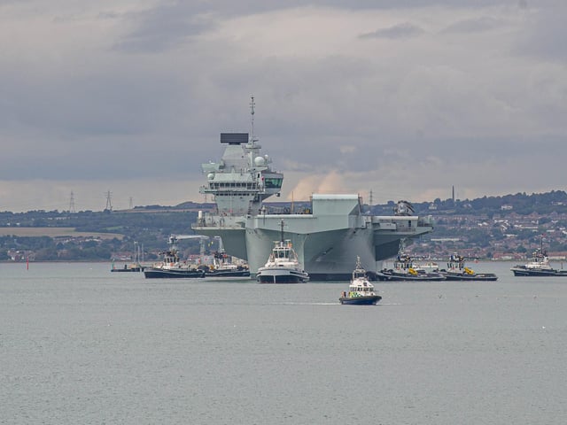 HMS Queen Elizabeth leaves Portsmouth on 9 September 2020. Pictured: View from Still & West Pub, Portsmouth of HMS QE. Picture: Habibur Rahman