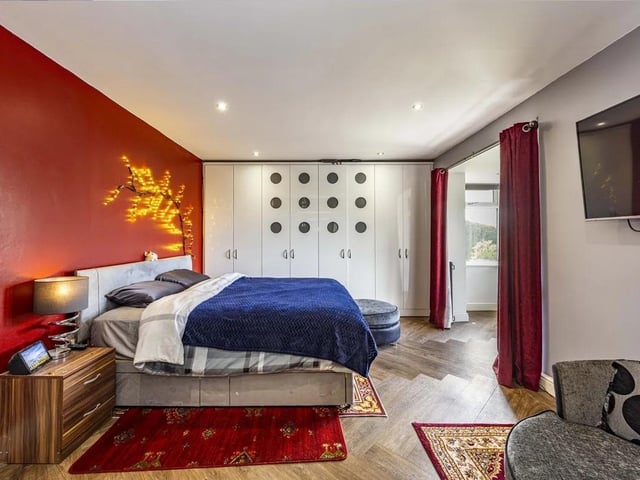 One of four spacious bedrooms in the family home