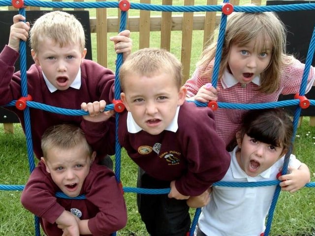 Delighted foundation stage pupils Dylan Tewson, Isabella Palfreyman, Taylor Bagshaw, George Berry and Chloe Baird celebrate the arrival of the Mansfield school's new adventure playground in 2006.