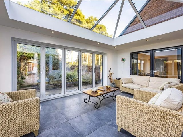 The orangery adds an additional layer of versatility, perfectly suited to relaxed evenings or entertaining throughout the seasons.