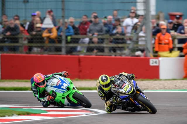 Kyle Ryde leads Lee Jackson into a corner at Donington Park. Photo by Michael Hallam.