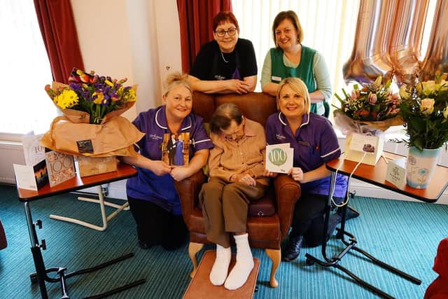 Ashdale Care Home resident Marjorie Holden has turned 100-years-old. Marjorie is pictured with Vicky Smith, Georgina Clamp, Joanne Tatt and Sarah Turner.