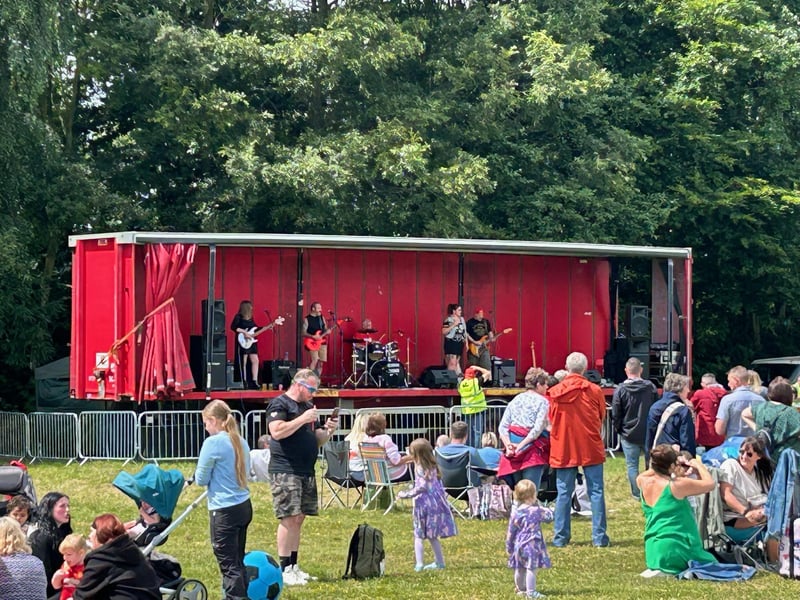 Live music played all afternoon on the main stage while families and friends gathered by the bar and food vendors. Christopher Nussey captured this candid photo.