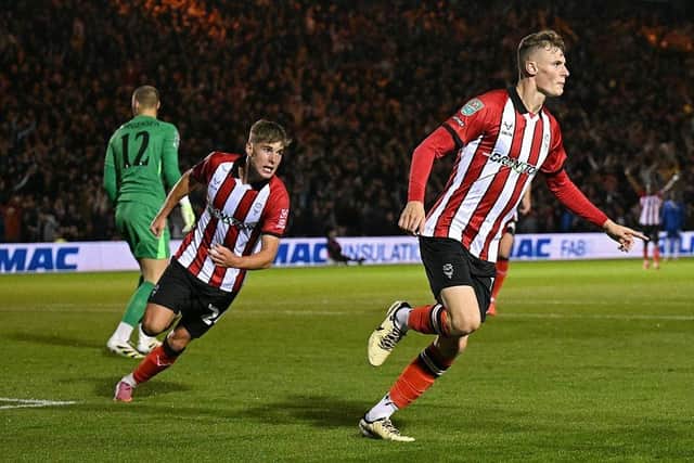 Lincoln City will play second tier football for the first time since 1961 after a stunning promotion-winning season.
